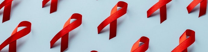 HIV ribbons on blue background